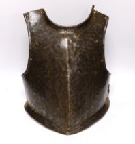 A mid 17th century infantry soldier’s breast plate, struck with armourer’s marks, 42cm high