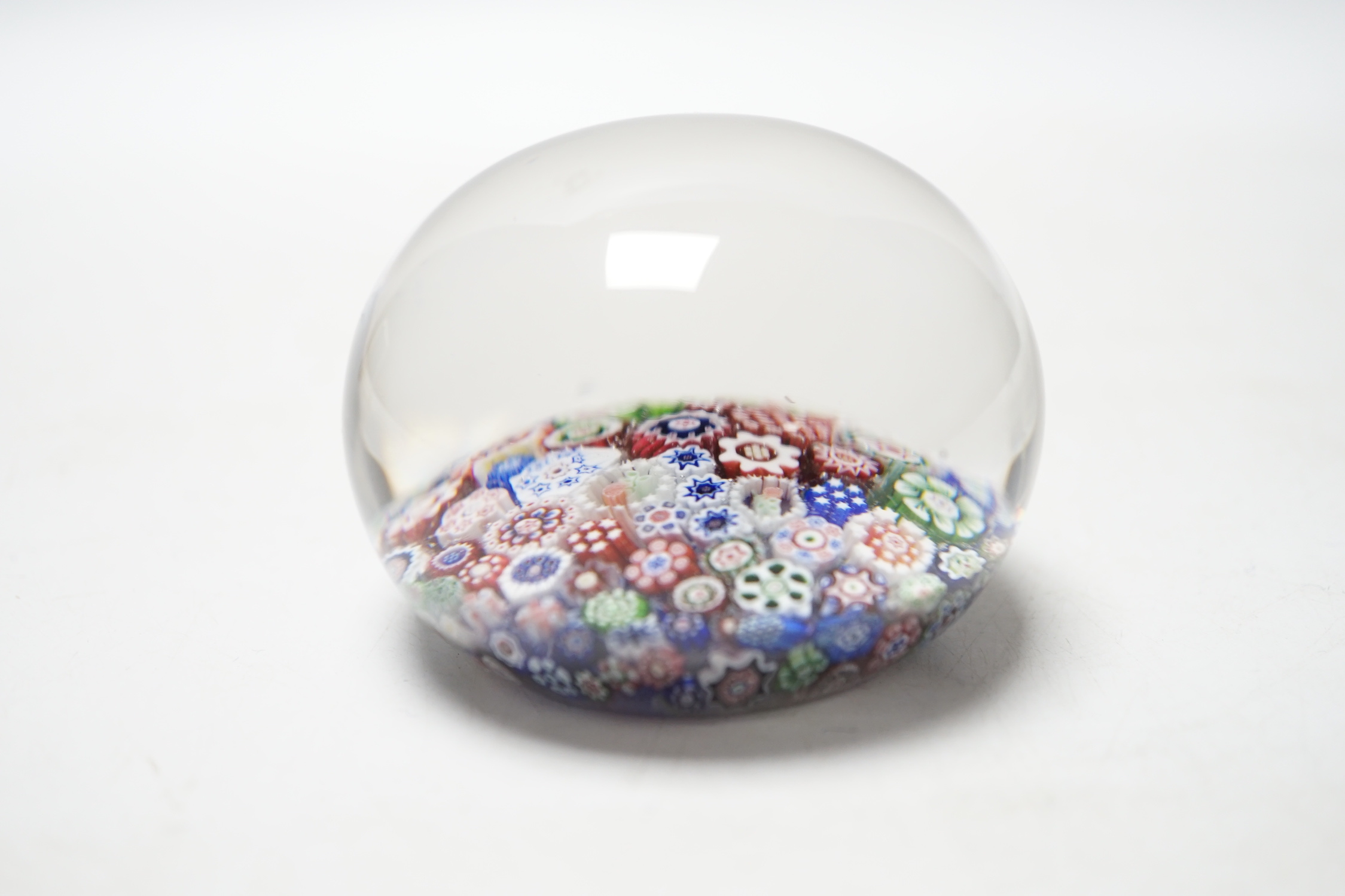 A Baccarat close packed millefiori paperweight with two rose corner, 7cm diameter - Image 2 of 3