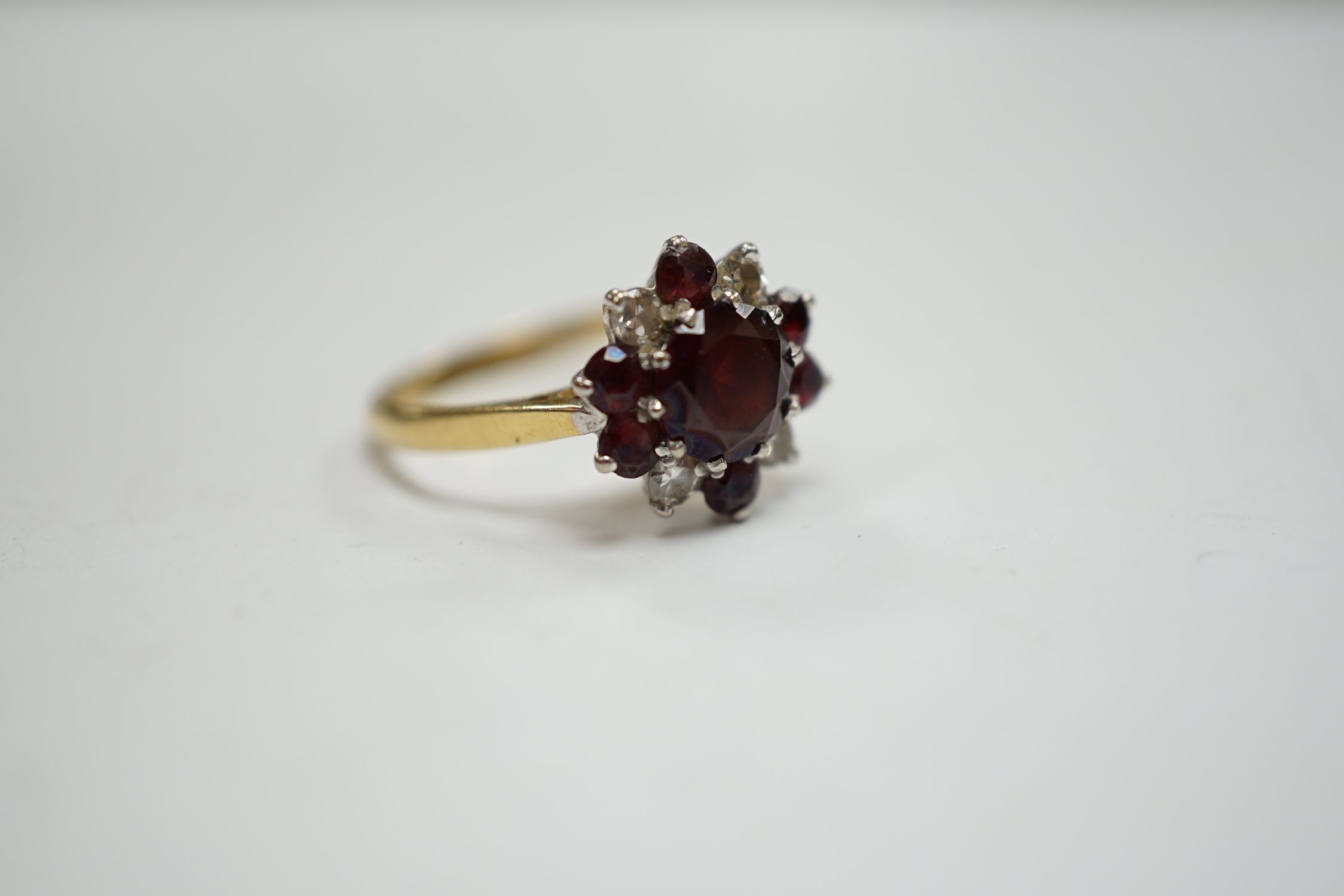 An 18ct red paste? and diamond cluster set flower head ring, size M, gross weight 3.2 grams. - Image 4 of 5
