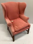 A George III style upholstered wing armchair, width 80cm, depth 80cm, height 110cm