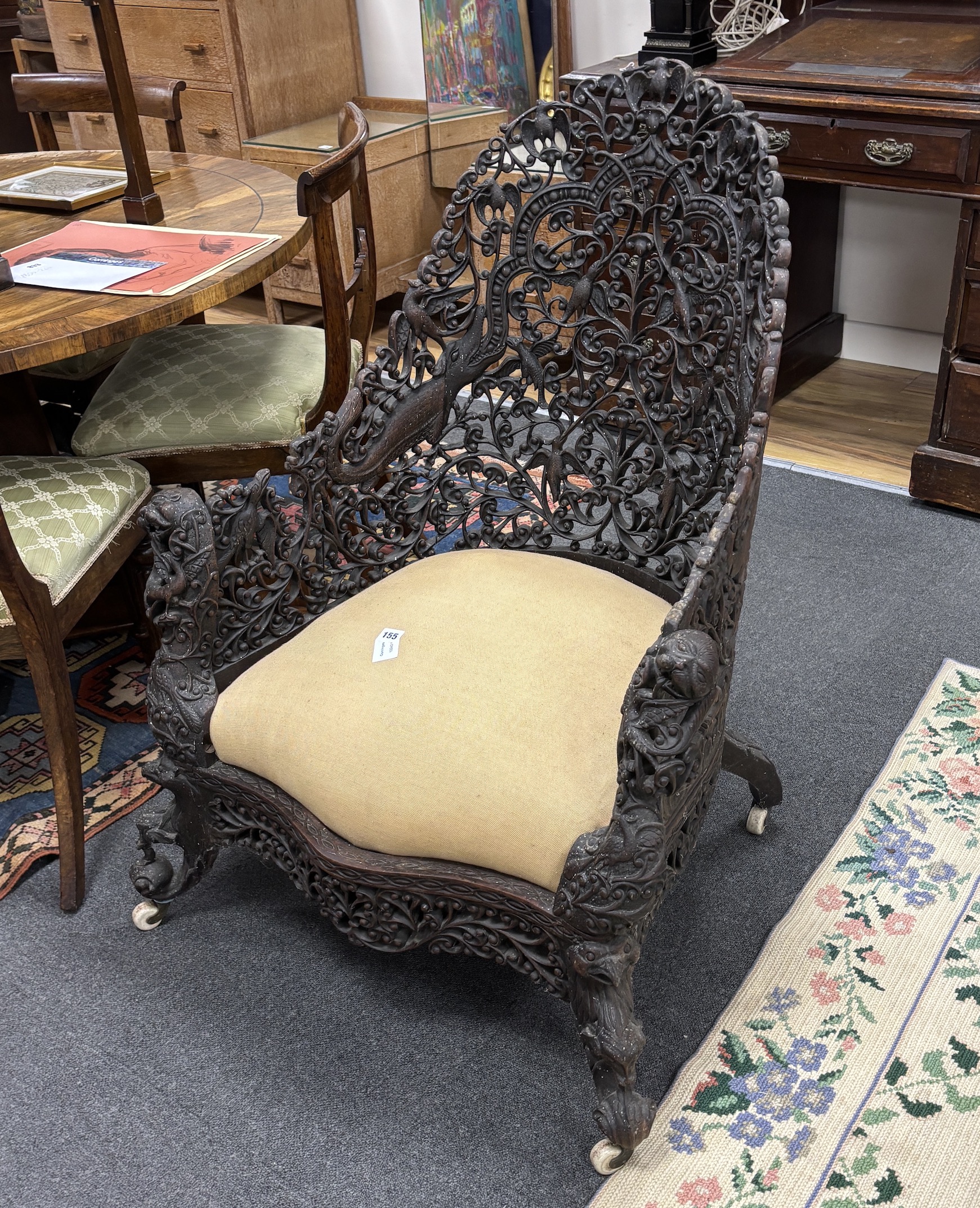 An Anglo Indian carved hardwood armchair, width 75cm, depth 58cm, height 100cm - Image 2 of 2