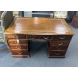 A George III style mahogany pedestal desk, width 138cm, depth 83cm, height 77cm together with a