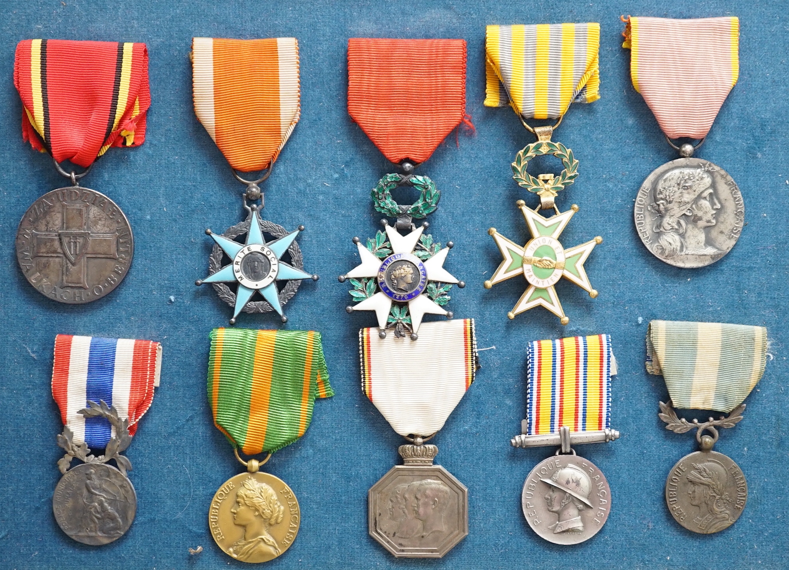Eighteen French medals, including The War Cross, TOE French Legion Cross, Medal of Honour, Croix