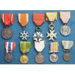 Eighteen French medals, including The War Cross, TOE French Legion Cross, Medal of Honour, Croix