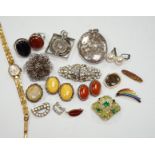 A silver and cabochon set dress ring, mixed costume jewellery and a lady's wrist watch.