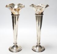 A pair of George V silver spill vases, with wavy rims, Walker & Hall, Sheffield, 1911, 27.1cm,