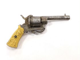A six shot, 7mm Belgian self cocking pinfire revolver, octagonal barrel, roll engraved frame and