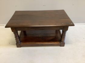 An 18th century style rectangular oak two tier coffee table, width 91cm, depth 56cm, height 42cm