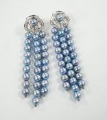 A modern pair of white metal, diamond chip cluster and bluey/grey three row cultured pearl tassel