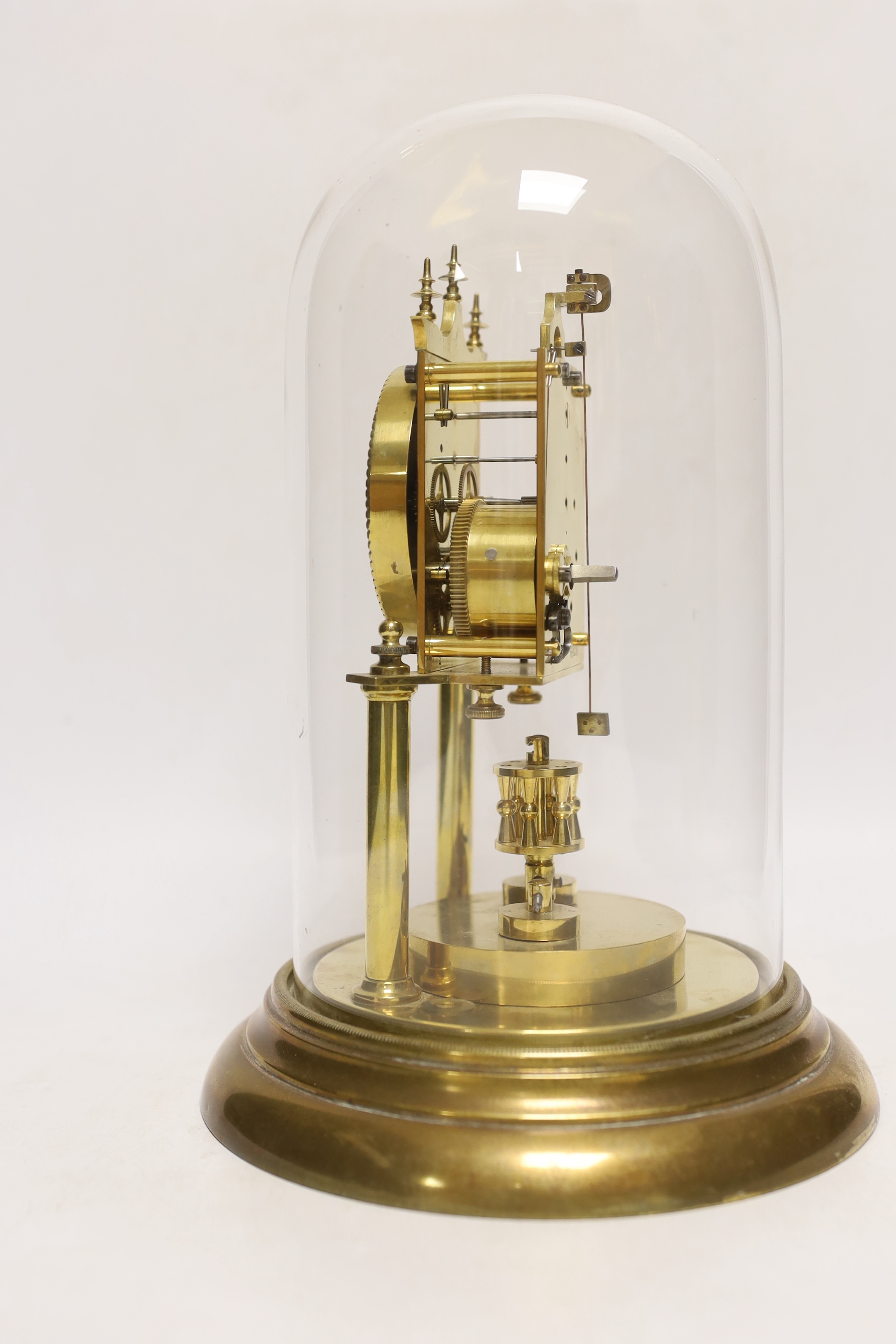 An early 20th century clock under a glass dome, 27cm high - Image 2 of 3