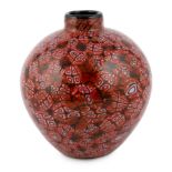 ** ** Vittorio Ferro (1932-2012) A Murano glass Murrine ovoid vase, in red, orange and white,