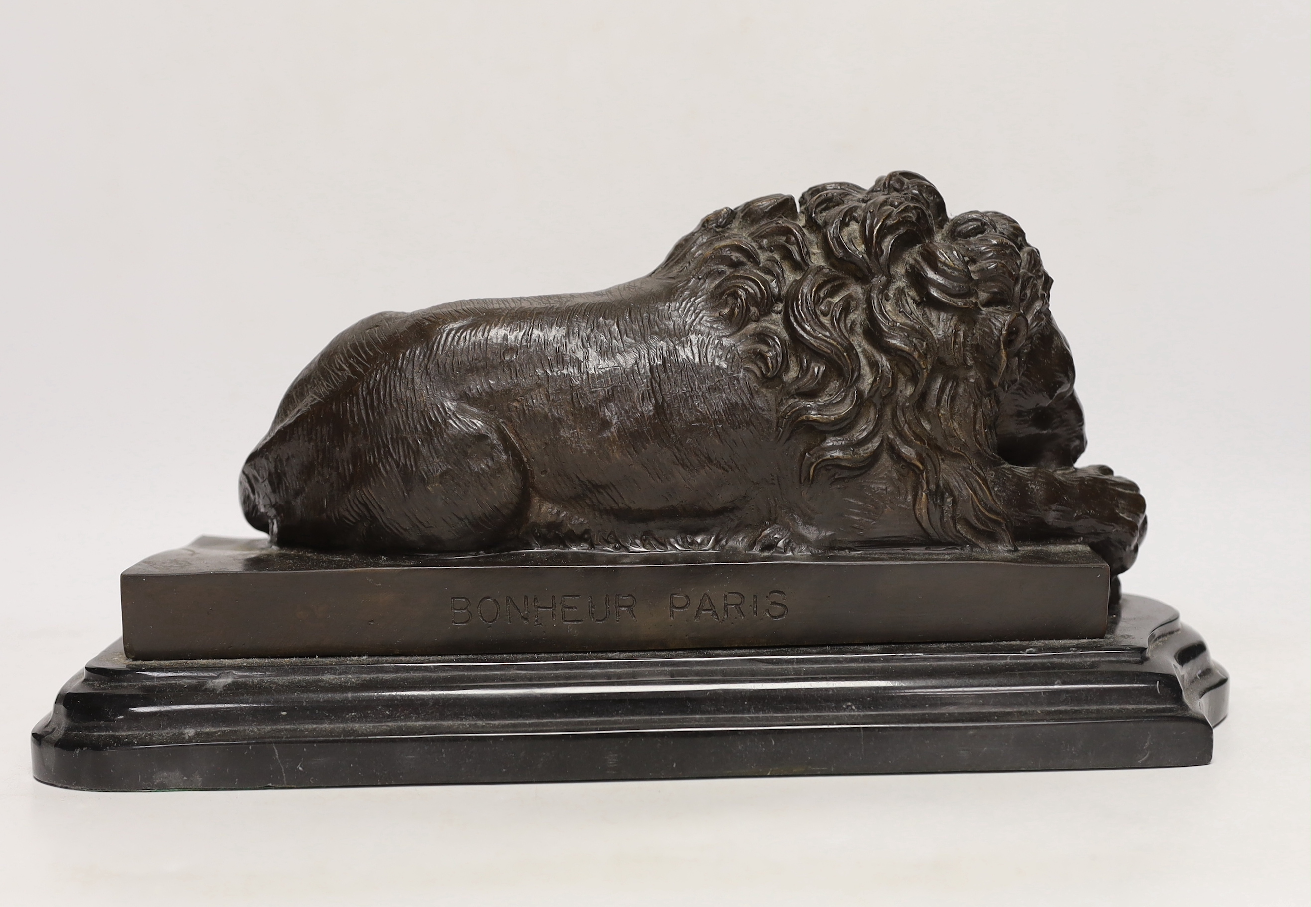 After Isadore Bonheur, a bronze figure of a recumbent lion, raised on marble base, 35cm wide - Image 3 of 4