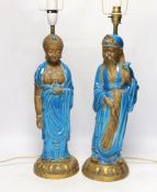 Two Chinese decoratively glazed and gilded pottery figures converted to lamp bases, approximately