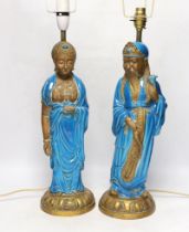 Two Chinese decoratively glazed and gilded pottery figures converted to lamp bases, approximately