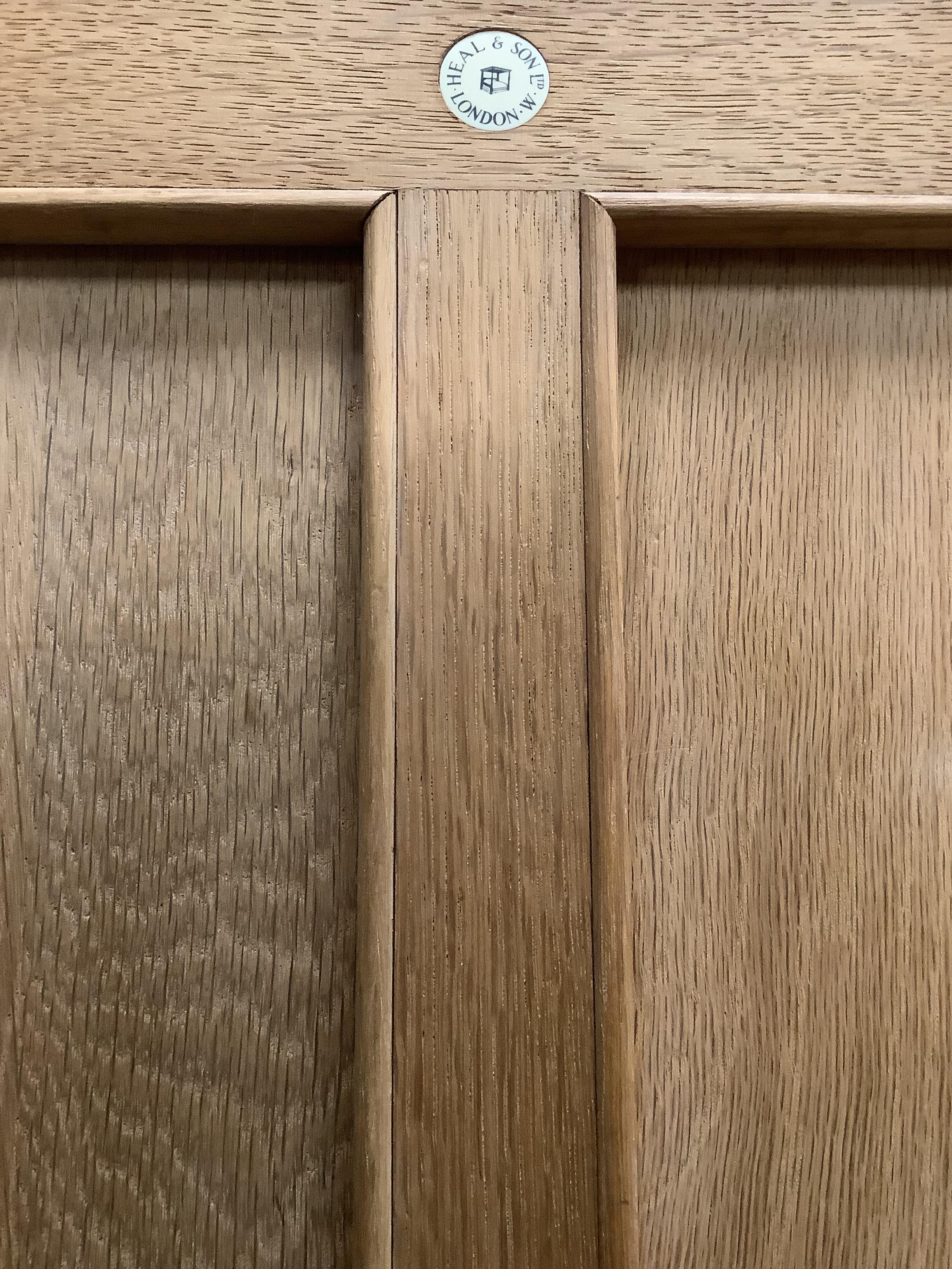Heal & Son Ltd., London, a pair of bleached oak corner wardrobes, width 94cm, depth 53cm, height - Image 2 of 3