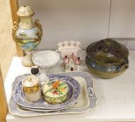 A large pottery tureen and cover, a large centrepiece and mixed ceramics including meat platters