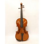 An early 20th century cased violin, length of the back 36cm