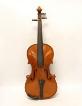 An early 20th century cased violin, length of the back 36cm