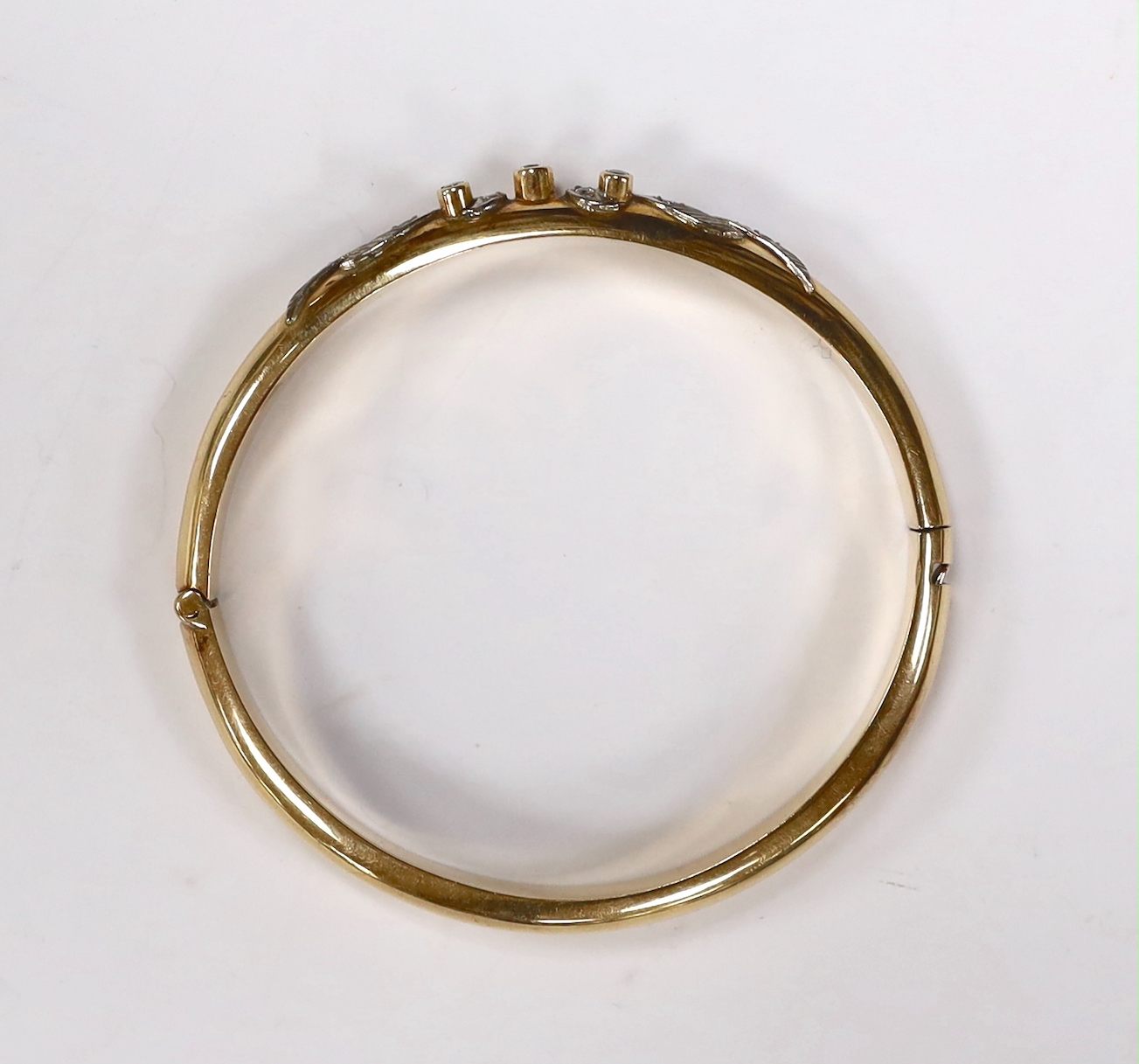 A 585 yellow metal and simulated diamond set hinged bangle, gross weight 20 grams. - Image 2 of 3