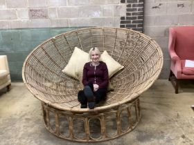 A large vintage bamboo circular daybed, diameter 200cm, height 110cm