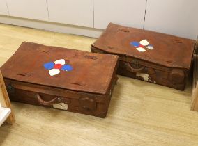 A pair of large brown leather suitcases, 81cm wide, 47cm deep