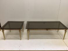 Two brass and smoked glass top coffee tables, larger width 133cm, depth 65cm, height 47cm