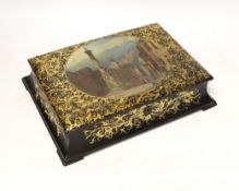 A Victorian stamped Jennens and Bettridge papier mache writing box, hand painted with a