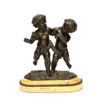 A 19th century French bronze model of two Putti, raised on shaped marble base, 22cm high