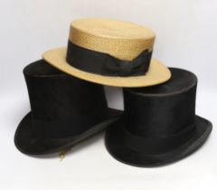 Two top hats and a straw boater