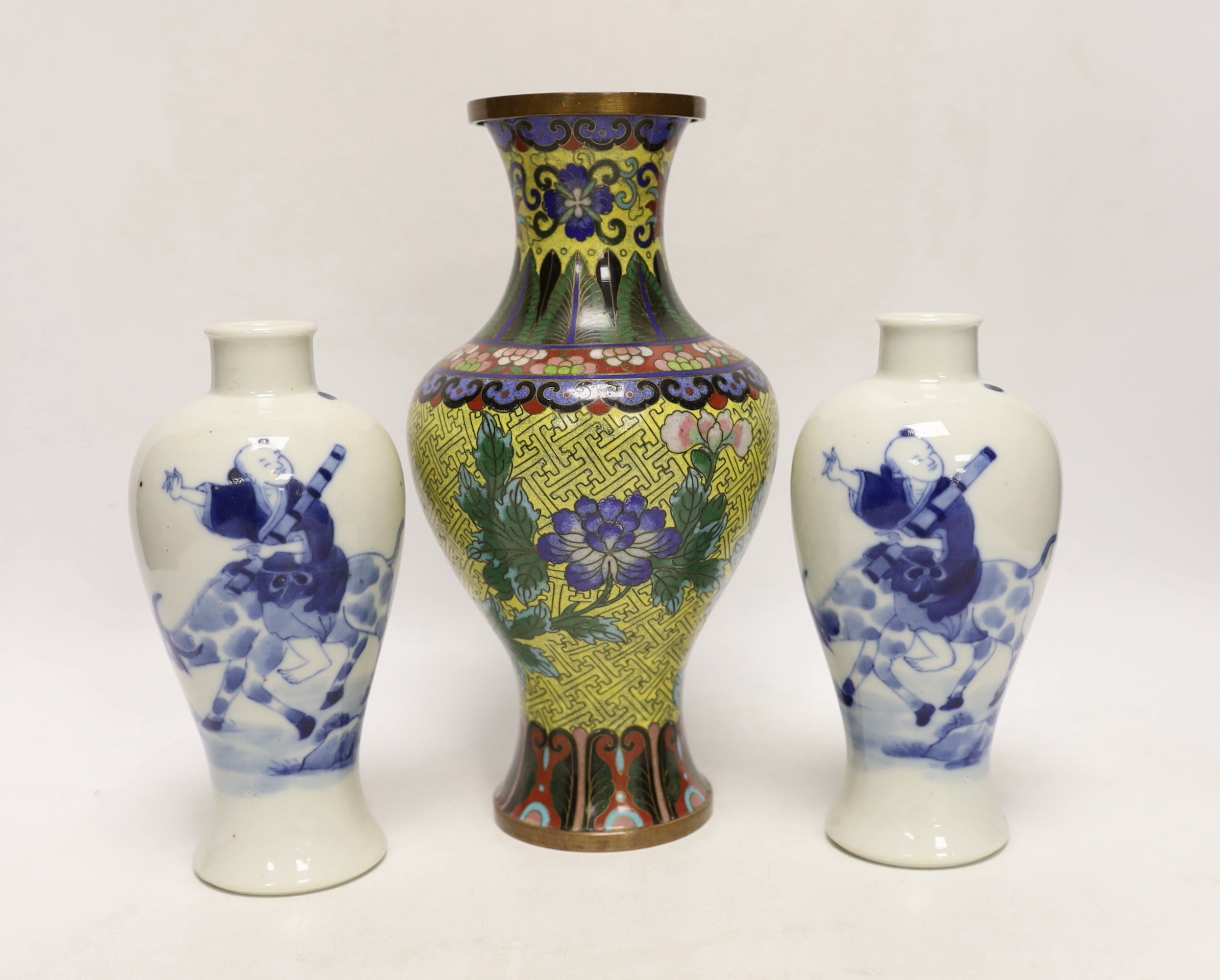 A pair of Chinese blue and white vases, c.1900 and a Chinese cloisonné enamel vase, largest 24cm