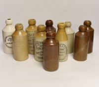 Early 20th century stoneware ginger beer bottles, one Hurstpierpoint, one Horsham, two Seaford and