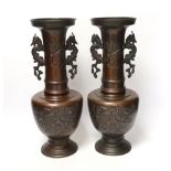 A pair of Japanese bronze vases, 38cm high