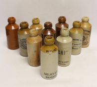 Early 20th century stoneware ginger beer bottles, two of Brighton, one of London, one of East