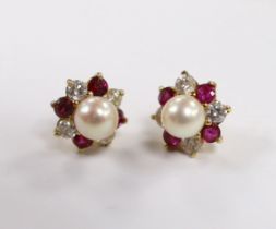 A pair of yellow metal, cultured pearl, ruby and diamond set flower head cluster ear studs (