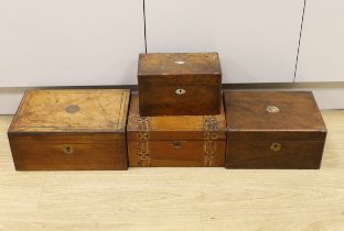 Three Victorian writing boxes and a tea caddy, largest 35cm wide, 15cm high, 24cm deep