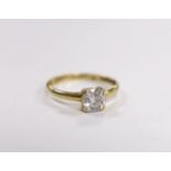 A 750 yellow metal and simulated diamond set ring, size N/O. gross weight 1.8 grams.