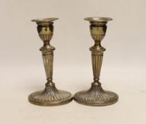 A pair of Edwardian silver mounted oval candlesticks, Barnett Henry Abrahams, Birmingham, 1908, 18.