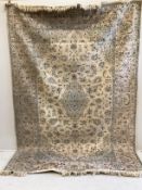 A Tabriz fawn ground carpet, 294 x 200cm