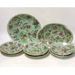 Eight 19th century Chinese celadon glazed famille rose dishes, largest 26cm