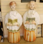 A pair of mid century celluloid illuminating choristers, approximately 127cm high