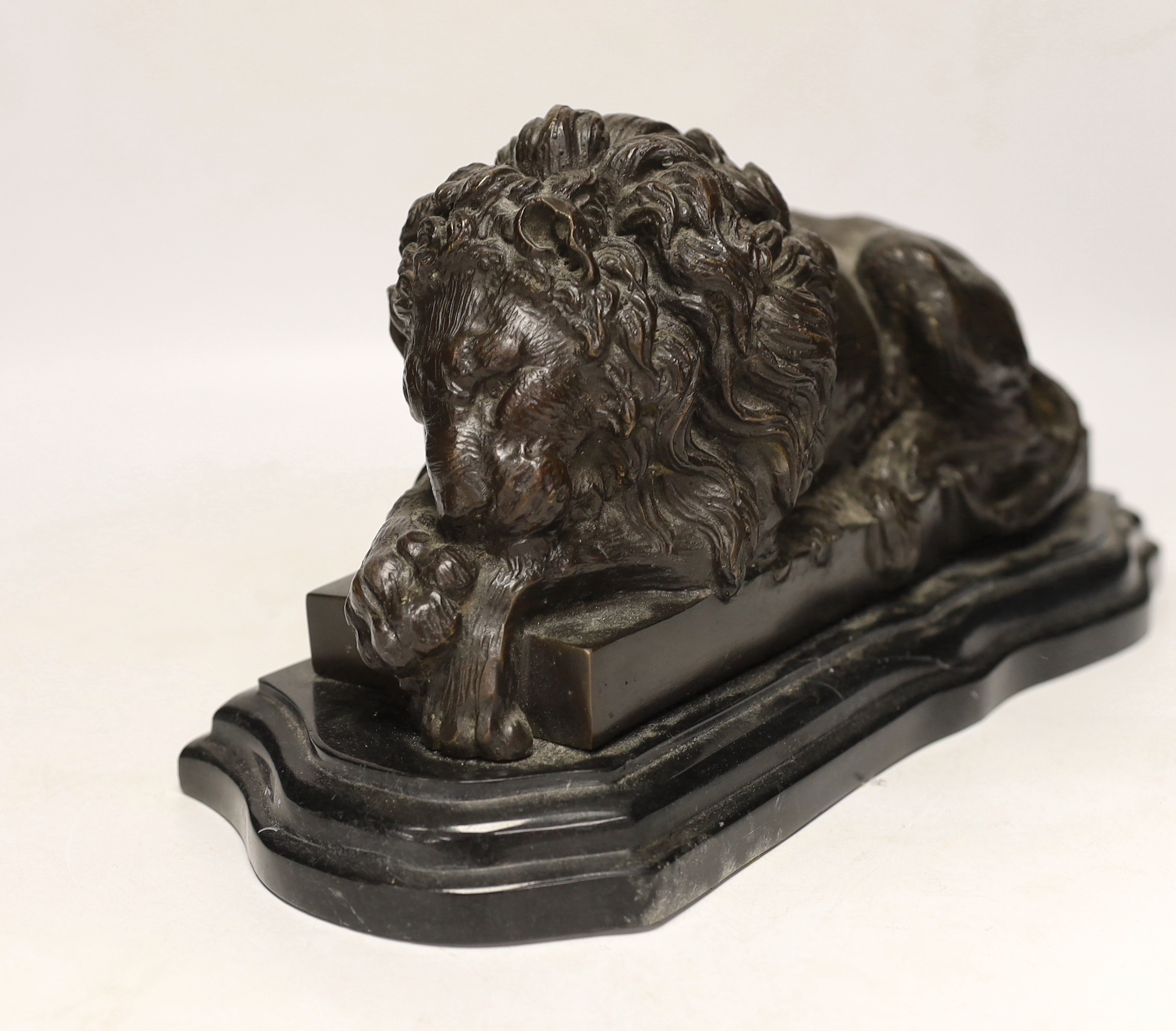 After Isadore Bonheur, a bronze figure of a recumbent lion, raised on marble base, 35cm wide - Image 2 of 4