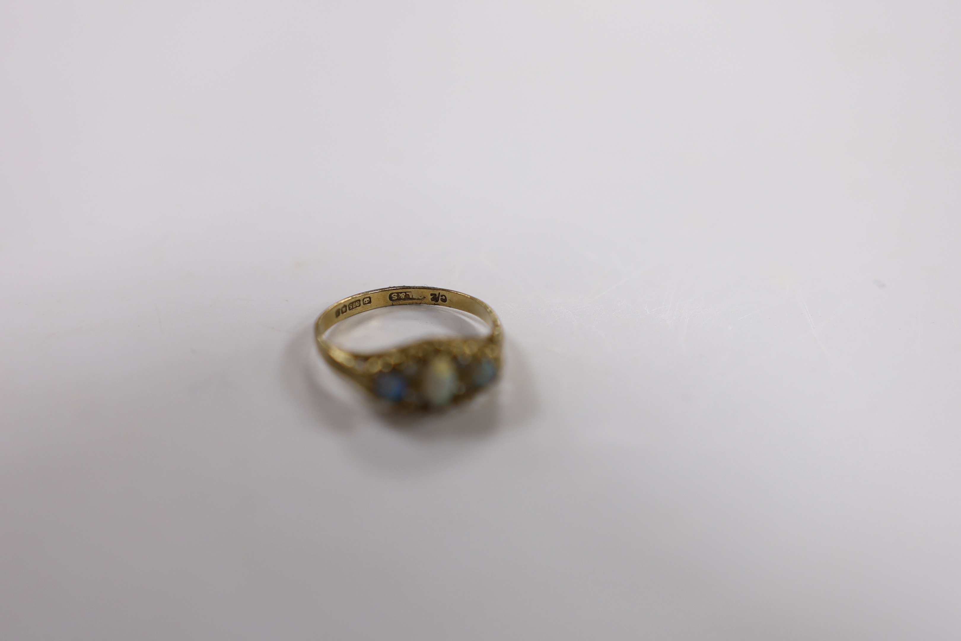 A 9ct gold and three stone white opal set ring, with CZ spacers, size L, gross weight 1.6 grams. - Image 2 of 2