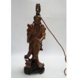 A Chinese carved wood figural table lamp, 43cm total