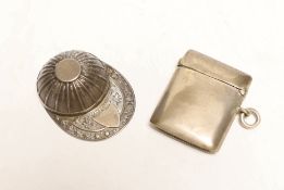 An Elizabeth II silver jockey cap caddy spoon, Francis Howard Ltd, Sheffield, 1973, 52mm and and