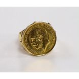 A 1912 gold half sovereign, now in yellow metal ring mount, size P, gross 9.4 grams.