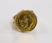 A 1912 gold half sovereign, now in yellow metal ring mount, size P, gross 9.4 grams.