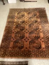 An Afghan gold ground rug, 215 x 160cm