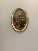 A Victorian style oval parcel gilt wall mirror, width 65cm, height 82cm
