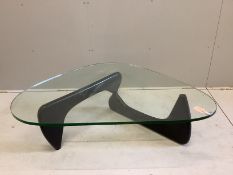 A Noguchi style glass topped coffee table, width 130cm, depth 92cm, height 40cm