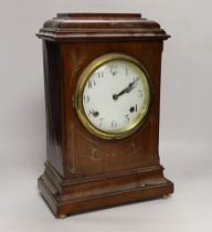 An American brass inlaid mantel clock, striking on a coiled gong, 39.5cm